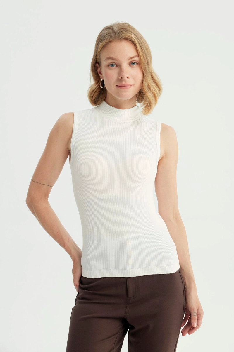 POLERA MUJER AJUSTADA SIN MANGAS CRUDO - 1