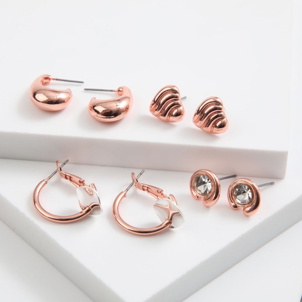SET DE 4 AROS LOVE ROSE GOLD ID - 1