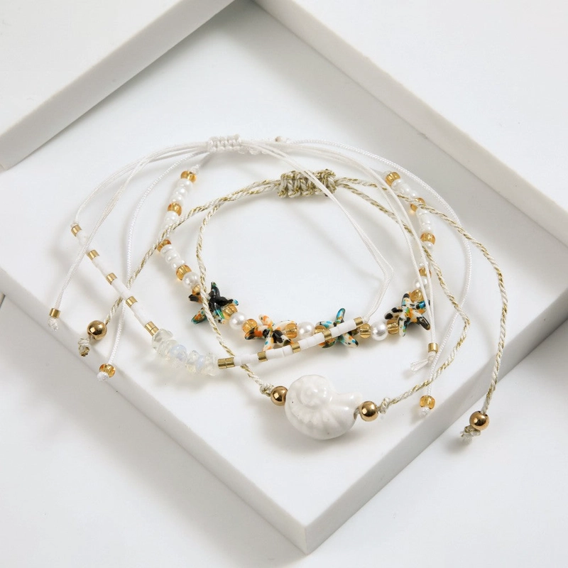 SET DE PULSERAS NATA BLANCO I-D - 1