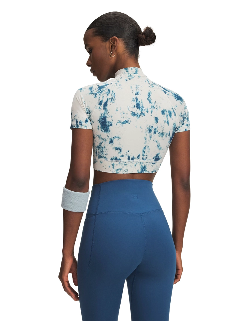 PRIMERA CAPA SUPERIOR MUJER HEATGEAR PRINT CROP MOCK SS BLANCO UNDER ARMOUR - 2