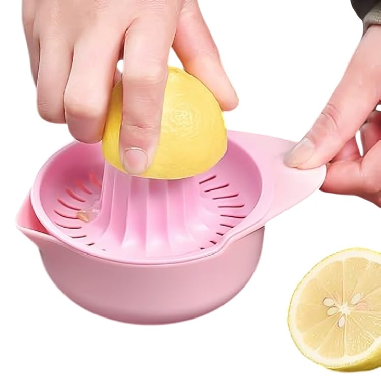 EXPRIMIDOR SACA JUGO MANUAL DE PLÁSTICO ROSA - 1