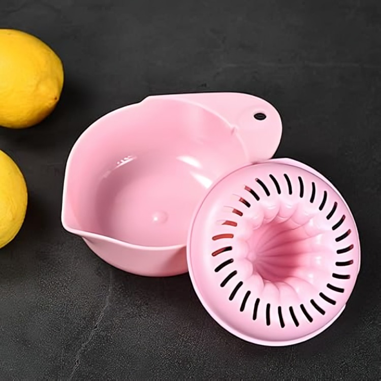 EXPRIMIDOR SACA JUGO MANUAL DE PLÁSTICO ROSA - 2