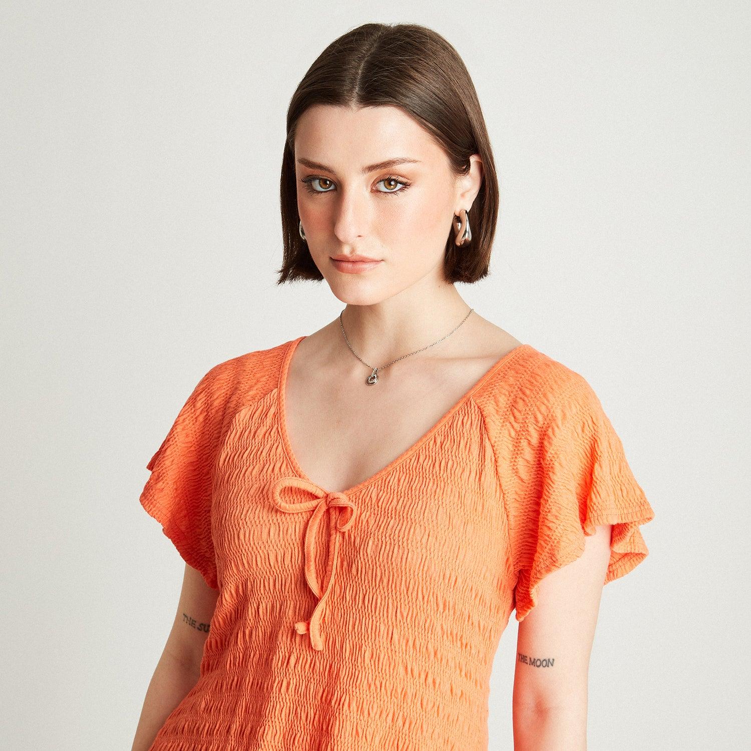 POLERA NARANJO MANGA CORTA CUELLO V - 3