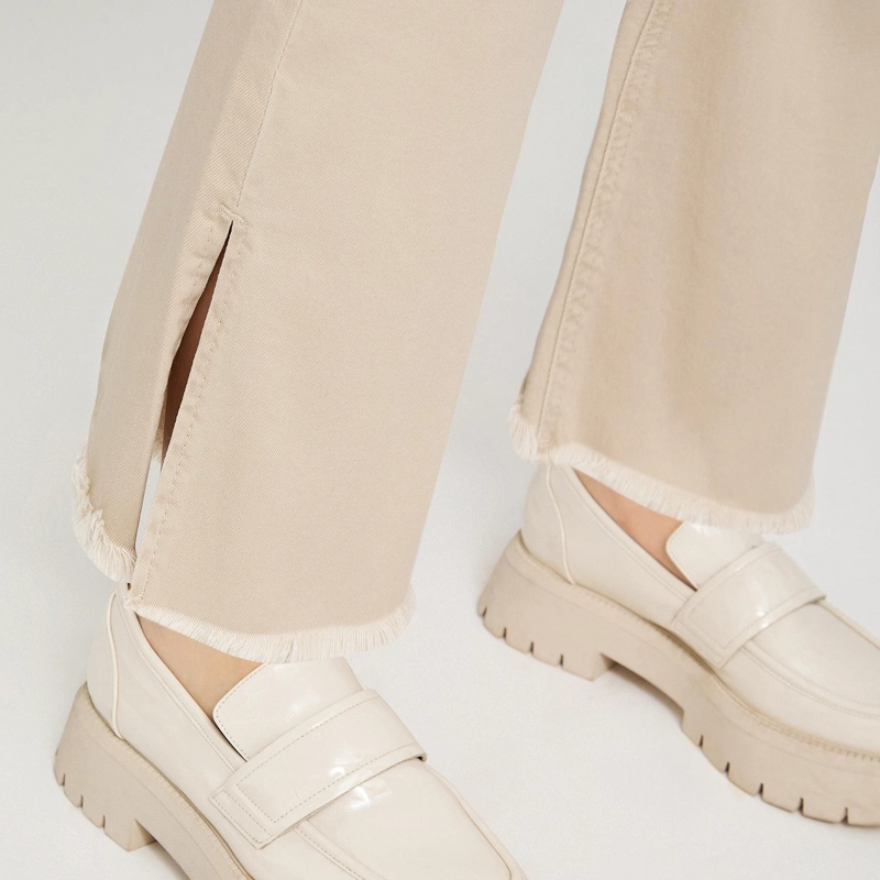 JEANS FLARE CON CINTURON BEIGE - 5