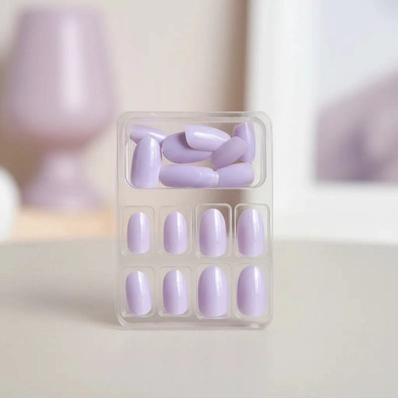 UÑAS POSTIZAS PRESS-ON FORMA DE ALMENDRA 24PCS UNICOLOR LILA PASTEL- LARGO MEDIO - 1