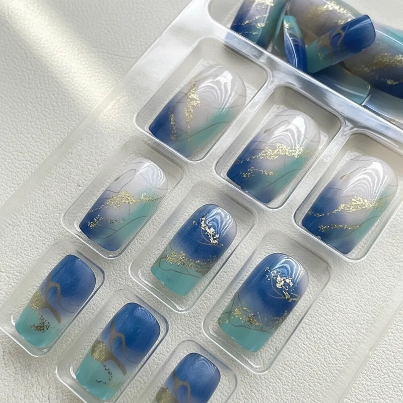 GENÉRICO UÑAS PRESS-ON SEMI CUADRADRA 24PC DISEÑO AZUL ACERO CON TOQUES DORADO