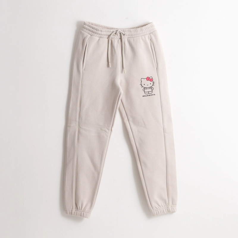 PANTALON DE BUZO NIÑA LOGO BEIGE HELLO KITTY - 1