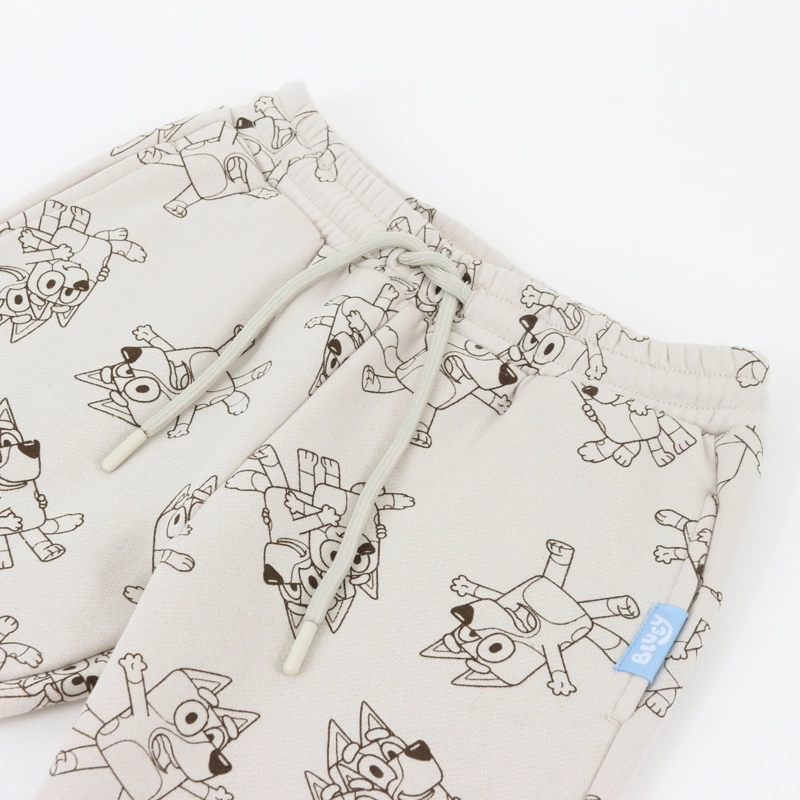 PANTALON DE BUZO NIÑO FULL PRINT LINEAL BEIGE BLUEY - 3