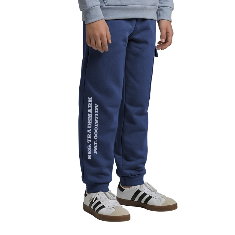 PANTALON BUZO FRANELA NIÑO CON BOLSILLO Y ESTAMPADO - 1