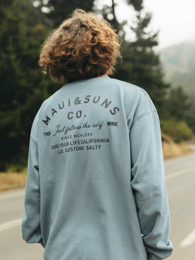 POLERON CR FOLLOW THE SURF CELESTE HOMBRE MAUI AND SONS - 2