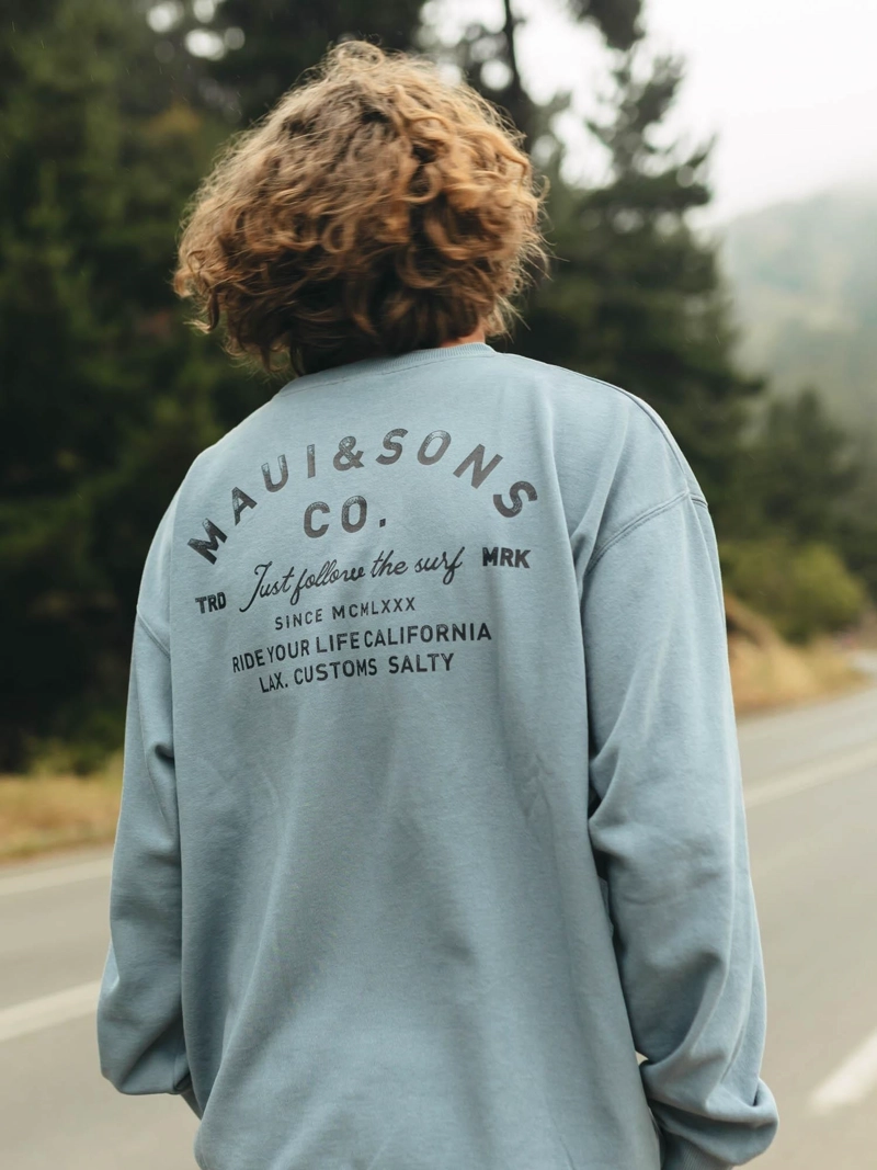POLERON CR FOLLOW THE SURF CELESTE HOMBRE MAUI AND SONS - 2