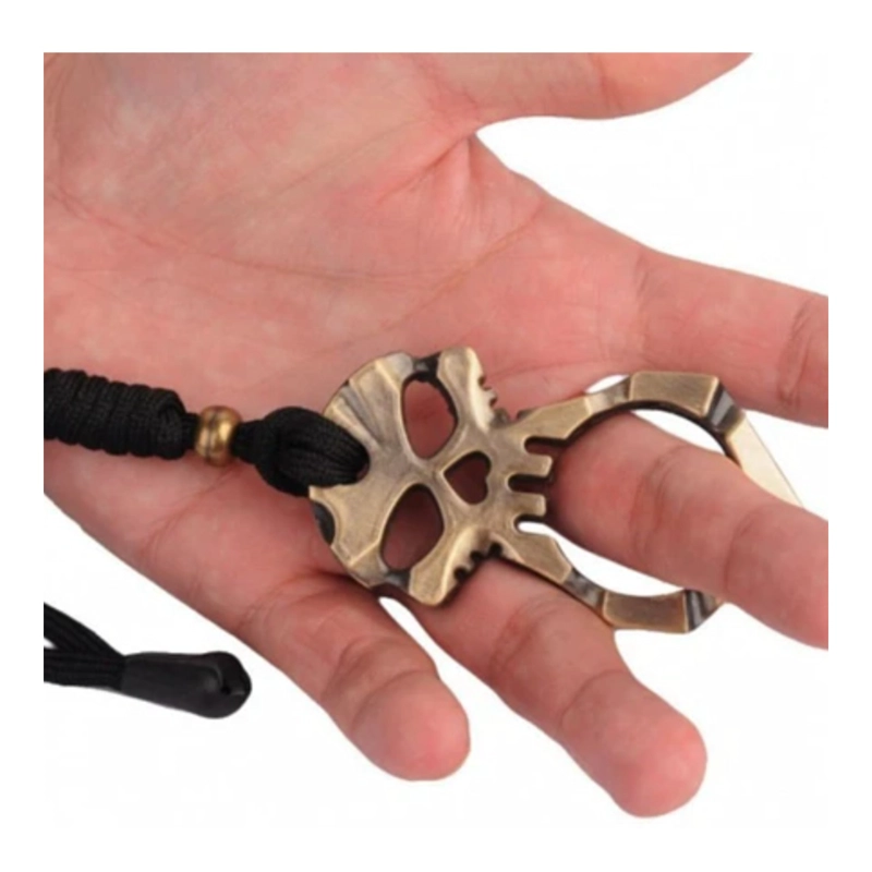 MANOPLA ANILLO PUÑO CALAVERA METAL CON CORDON - 3