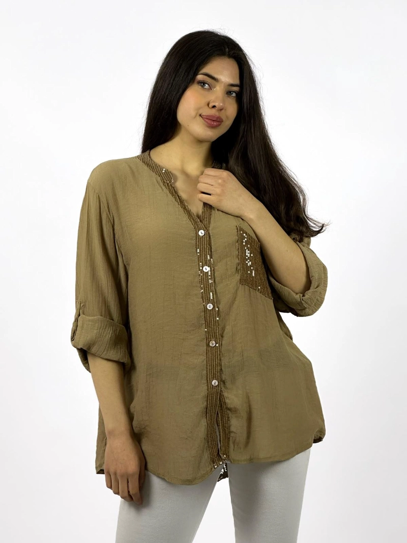 BLUSA CASUAL CON BRILLOS DORSO TEJIDO CELESTE - 1