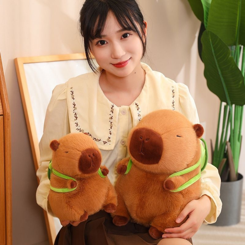 PELUCHE DE CAPIBARA KAWAII CARPINCHO MOCHILA TORTUGA 30CM - 4