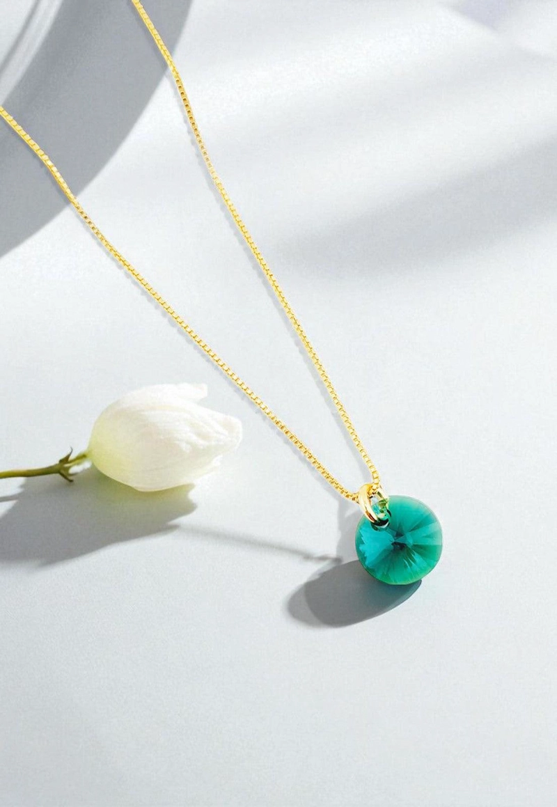 COLLAR PUNTO DE LUZ GOLD 24K CREADO CON CRISTALES DE SWAROVSKI® EMERALD - 3