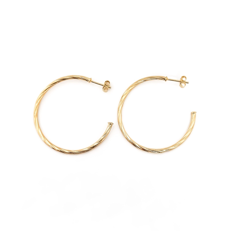 AROS ANDREA COGGIOLA JOYAS ARGOLLAS TORCIDAS 40MM ENCHAPADO ORO 18K - 1