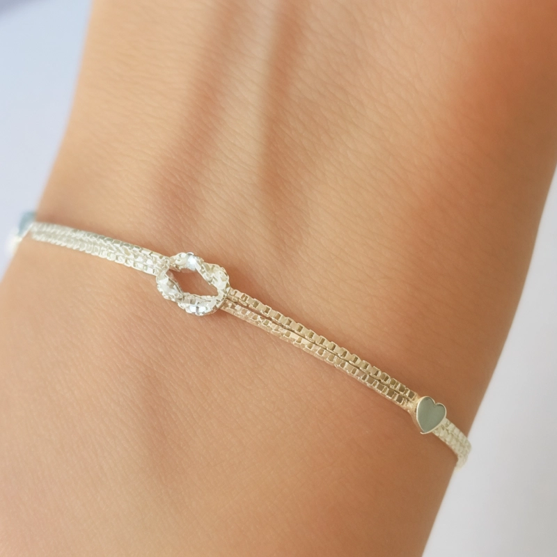 PULSERA ANDREA COGGIOLA JOYAS NUDO 2 CORAZONES PLATA FINA 925 - 3