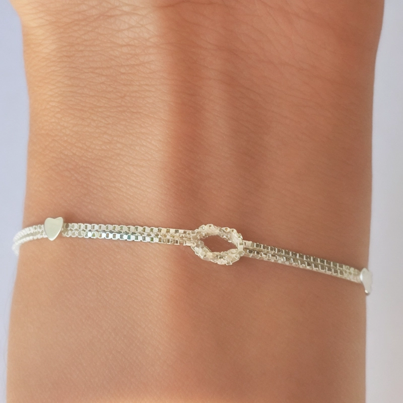 PULSERA ANDREA COGGIOLA JOYAS NUDO 2 CORAZONES PLATA FINA 925 - 4