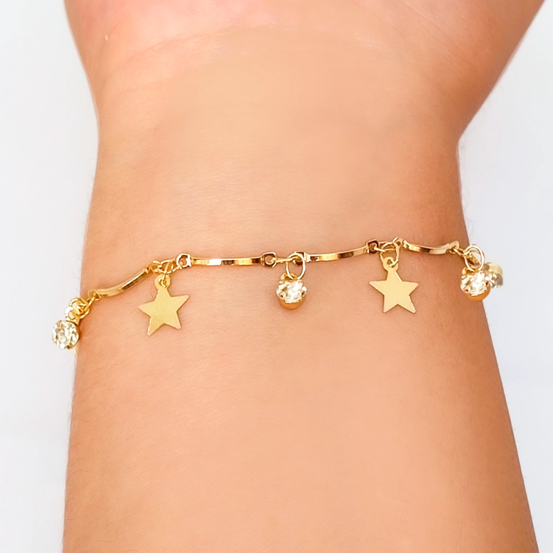 PULSERA ANDREA COGGIOLA JOYAS ESTRELLAS PUNTO DE LUZ ENCHAPADO ORO 18K - 2