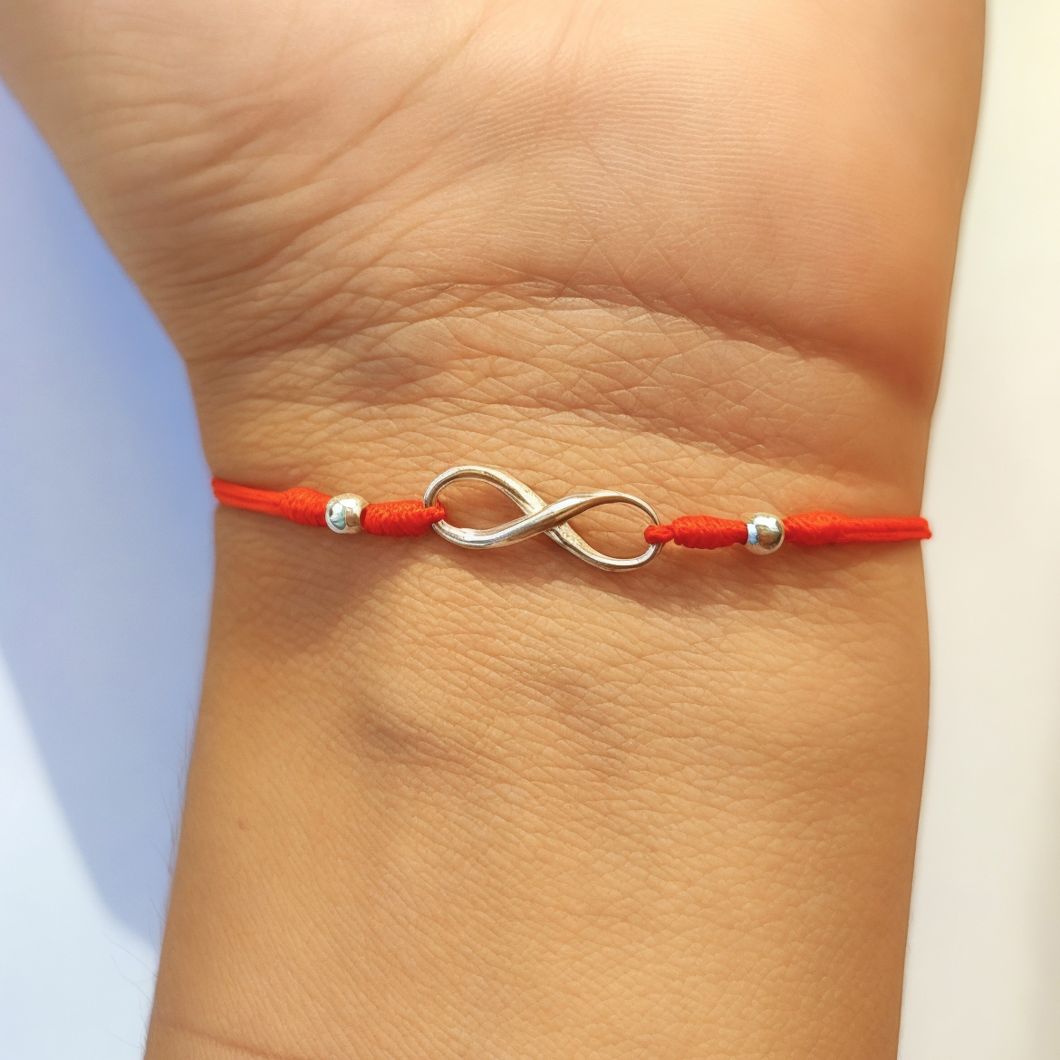 PULSERA ANDREA COGGIOLA JOYAS CORDÓN ROJO FINO INFINITO PLATA FINA 925 - 2