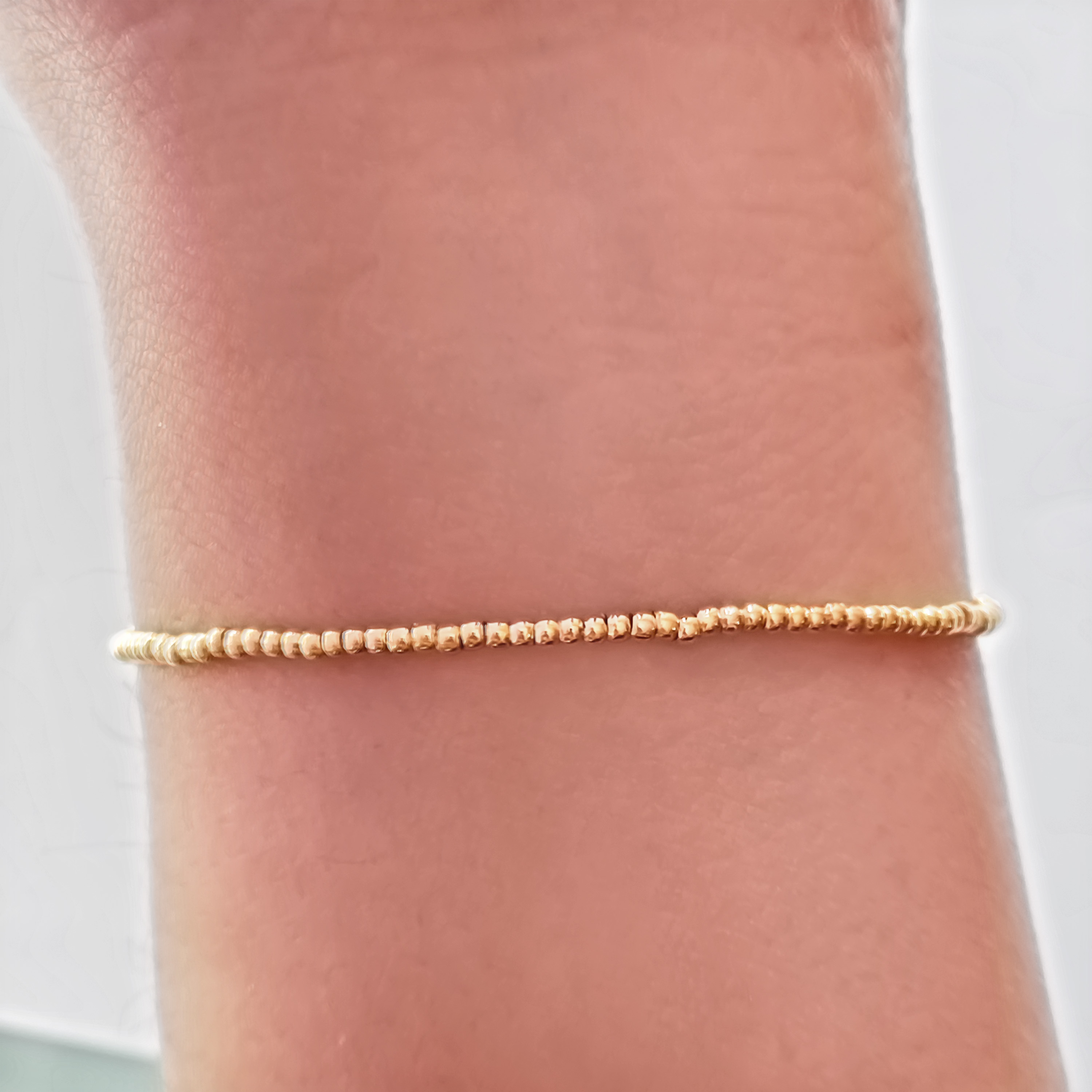 PULSERA ANDREA COGGIOLA JOYAS BOLITAS ENCHAPADO ORO 18K ELÁSTICADA - 3
