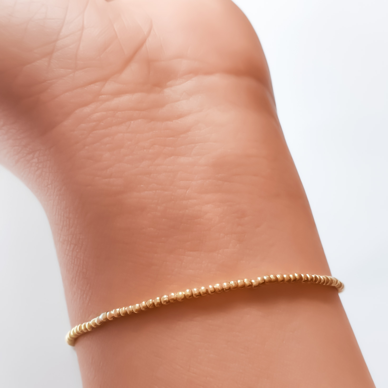 PULSERA ANDREA COGGIOLA JOYAS BOLITAS ENCHAPADO ORO 18K ELÁSTICADA - 4
