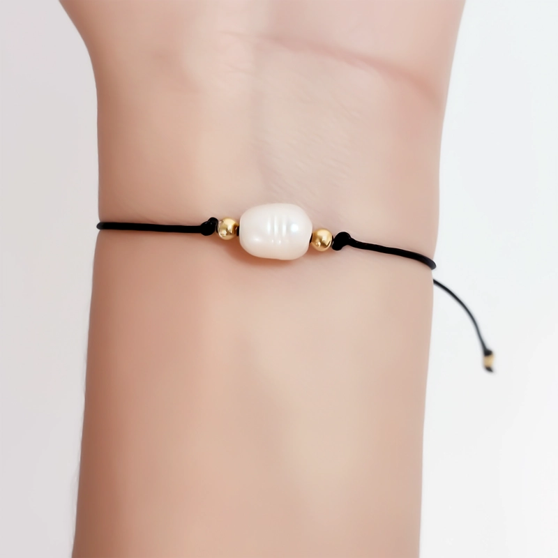 PULSERA PERLA DE RIO CORDON NEGRO BOLITA ENCHAPADO ORO 18K - 2