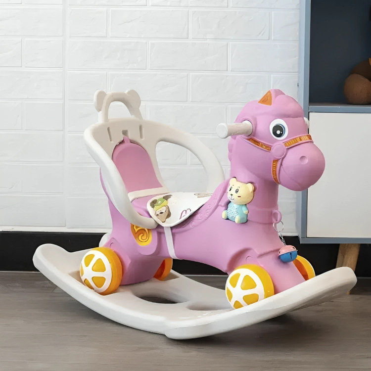 CABALLITO MECEDOR INFANTIL CON RUEDAS ROSADO - 1