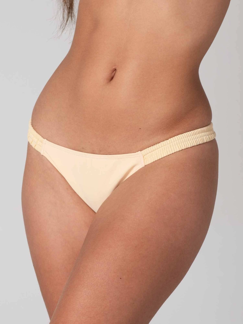 BOTTOM DE BIKINI DAIKIRI MUJER CALZON FRUNCIDO COSTADOS CREMA PROTECCION UV50+ - 1