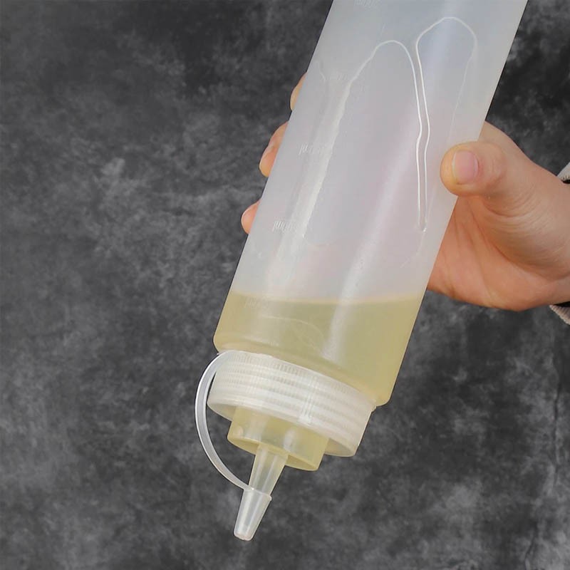SET DE 2 BOTELLAS DISPENSADORA SALSA GRADUADA TRANSPARENTE 600ML - 7