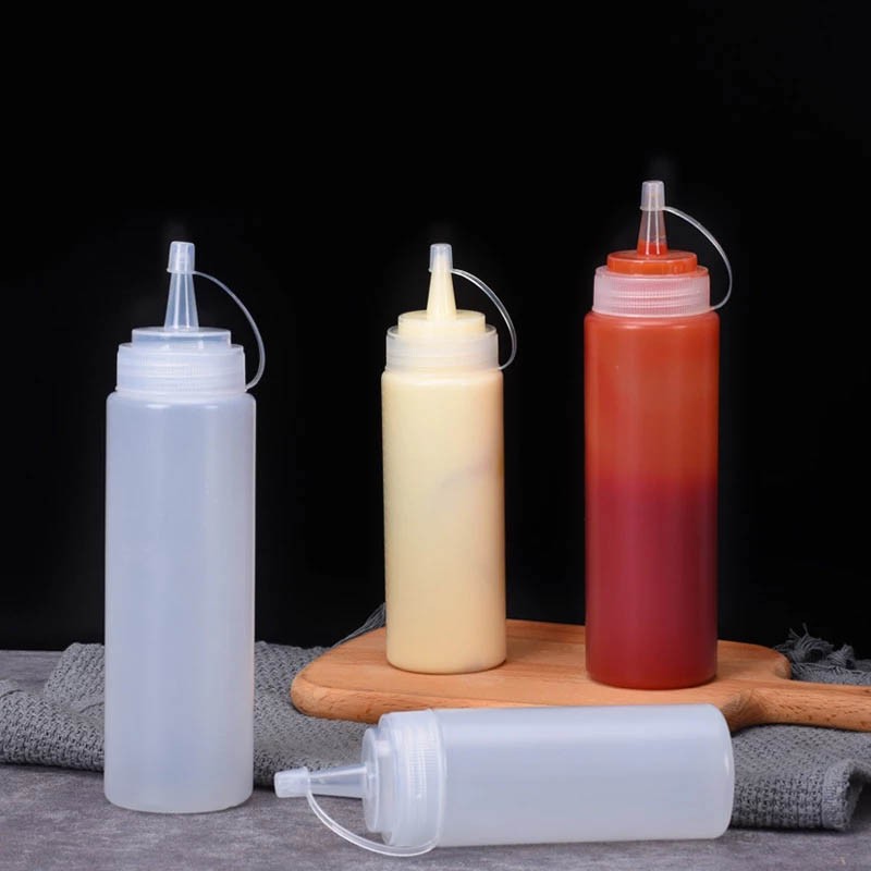 SET DE 2 BOTELLAS DISPENSADORA SALSA GRADUADA TRANSPARENTE 600ML - 9