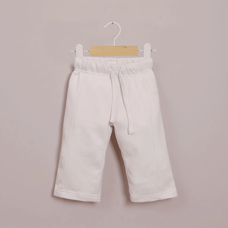 PANTALON DE BUZO CREMA DE NIÑA OPALINE - 1