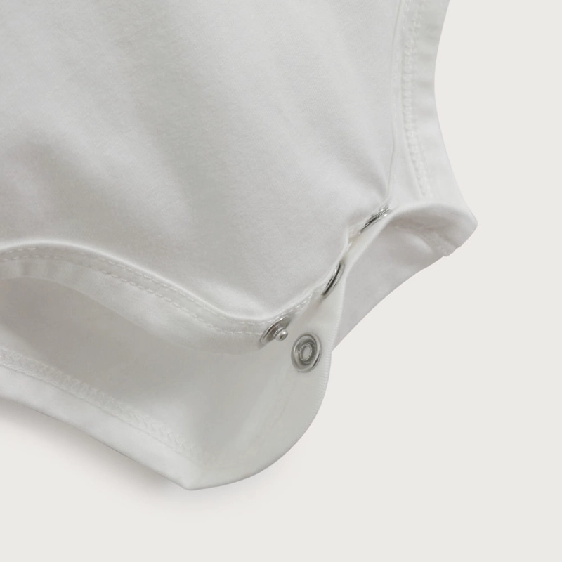 BODY BLANCO CON BOTONES DE BEBE  NIÑO OPALINE - 5