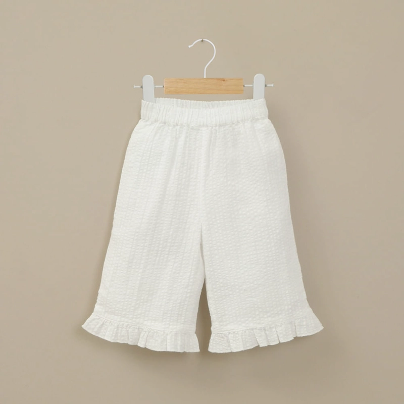 PANTALON PALAZZO BLANCO DE NIÑA OPALINE - 1