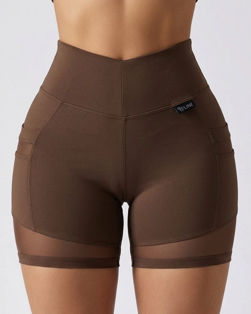 SHORT DEPORTIVO MUJER SUPLEX CON BOLSILLO Y MALLA - 1