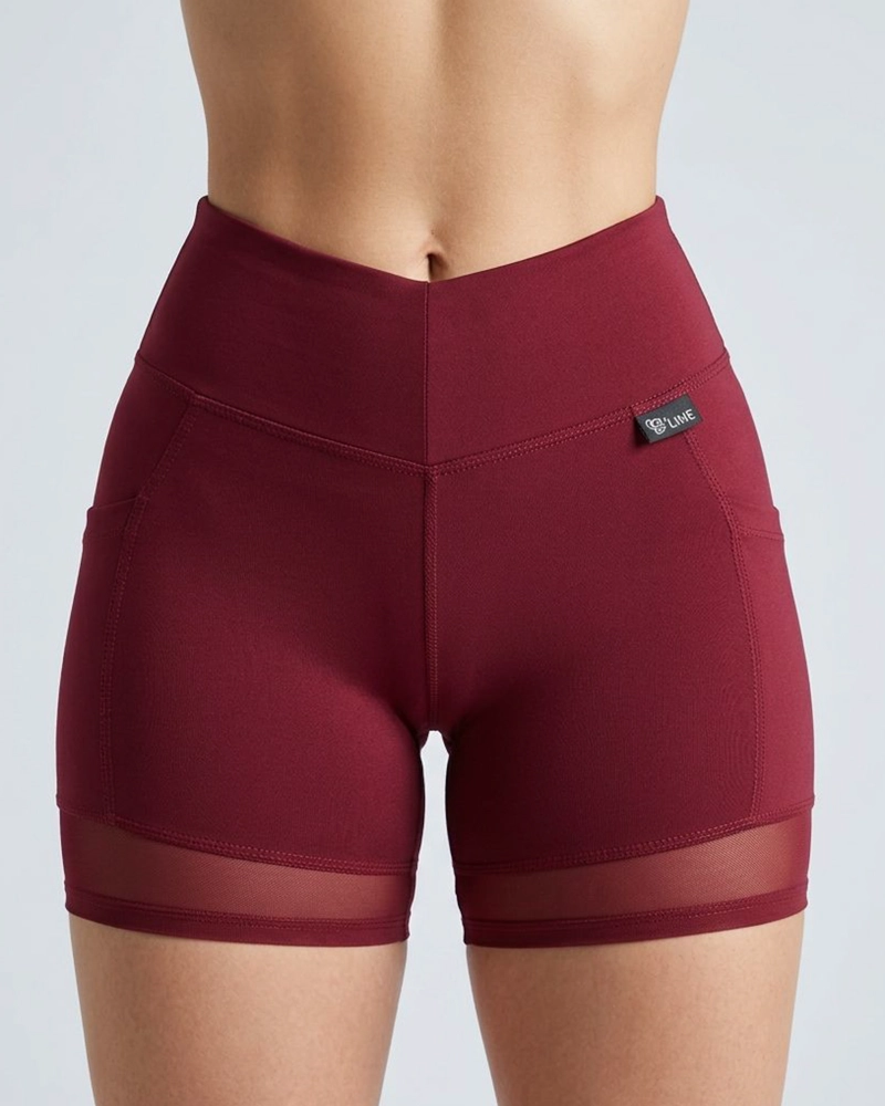 SHORT DEPORTIVO MUJER SUPLEX CON BOLSILLO Y MALLA - 1