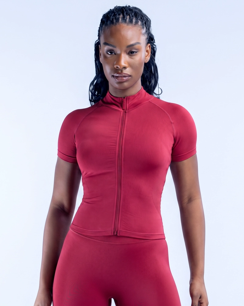 POLERA DEPORTIVA AJUSTADA CON CIERRE MANGA CORTA FITNESS - 1