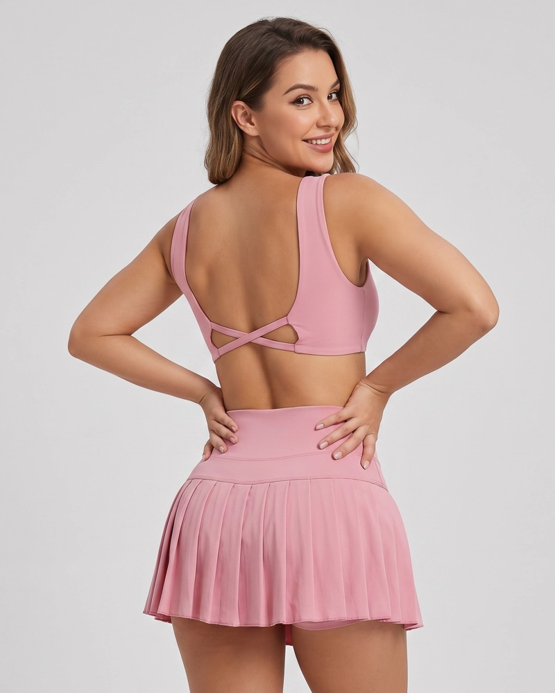 CONJUNTO FITNESS MUJER FALDA SHORT PLISADA Y TOP DEPORTIVO - 1