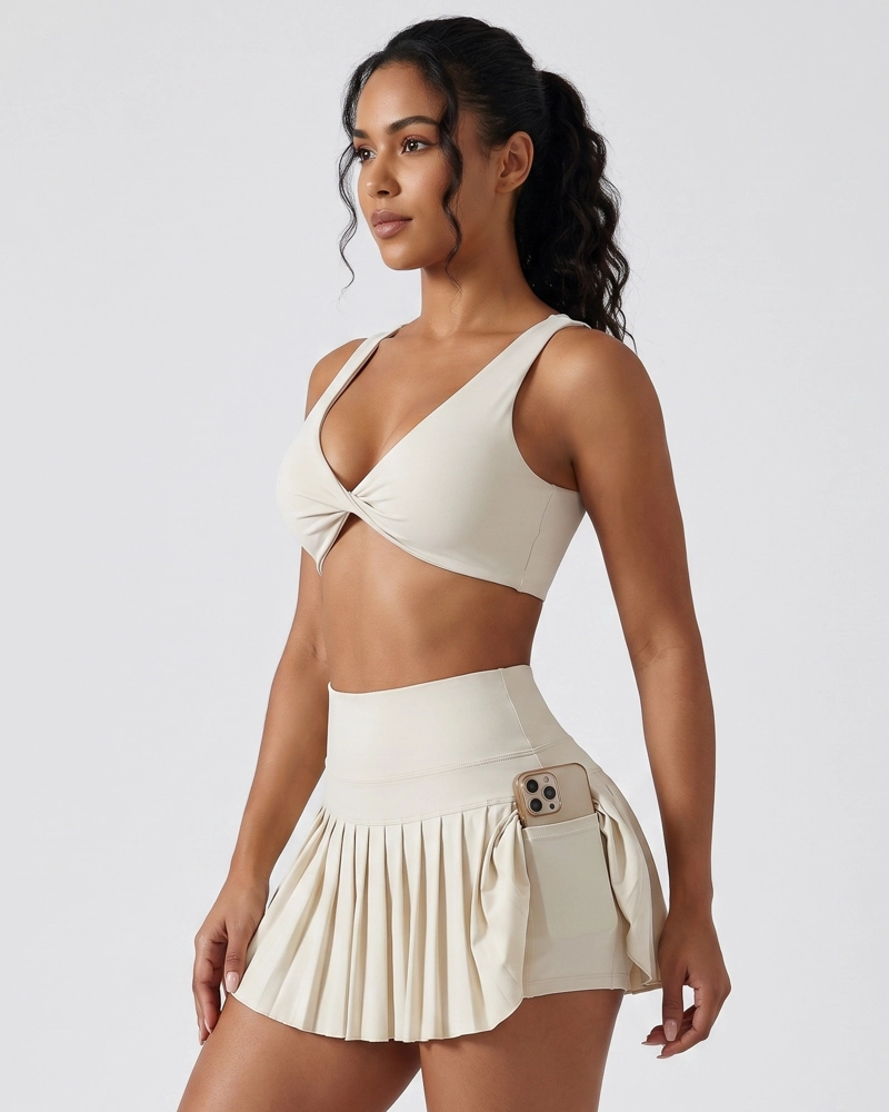CONJUNTO FITNESS MUJER FALDA SHORT PLISADA Y TOP DEPORTIVO - 4