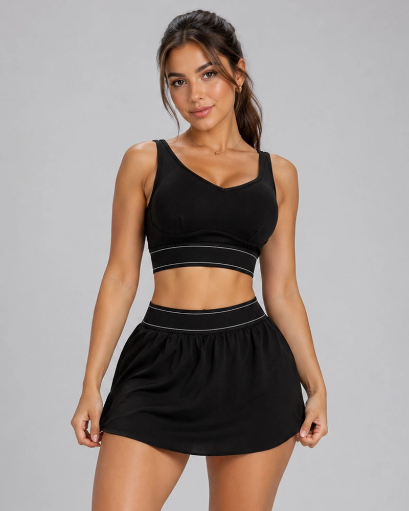 CONJUNTO DEPORTIVO 2 PIEZAS PETO Y FALDA SHORT CON BOLSILLO - 1