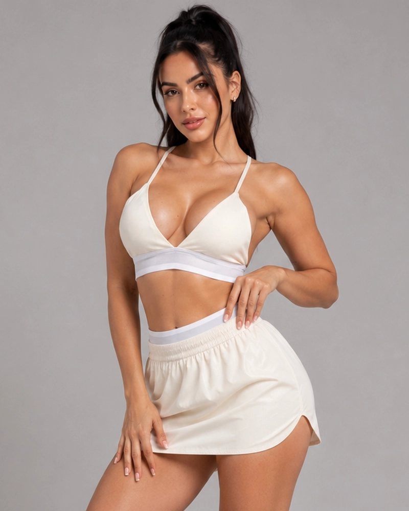 CONJUNTO DEPORTIVO 2 PIEZAS TOP Y FALDA SHORT CON CALZA INTERIOR - 6