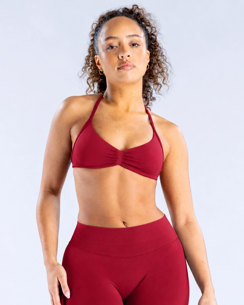 SET DEPORTIVO MUJER CALZA LEGGING Y TOP PETO HALTER - 1