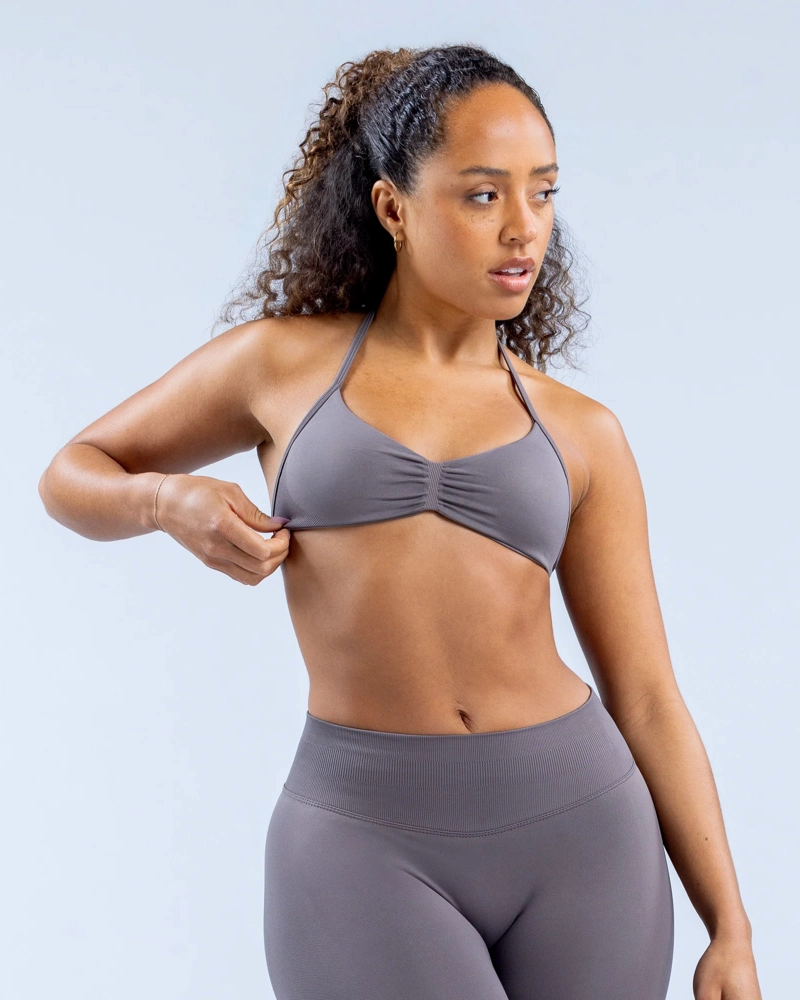 SET DEPORTIVO MUJER CALZA LEGGING Y TOP PETO HALTER - 1