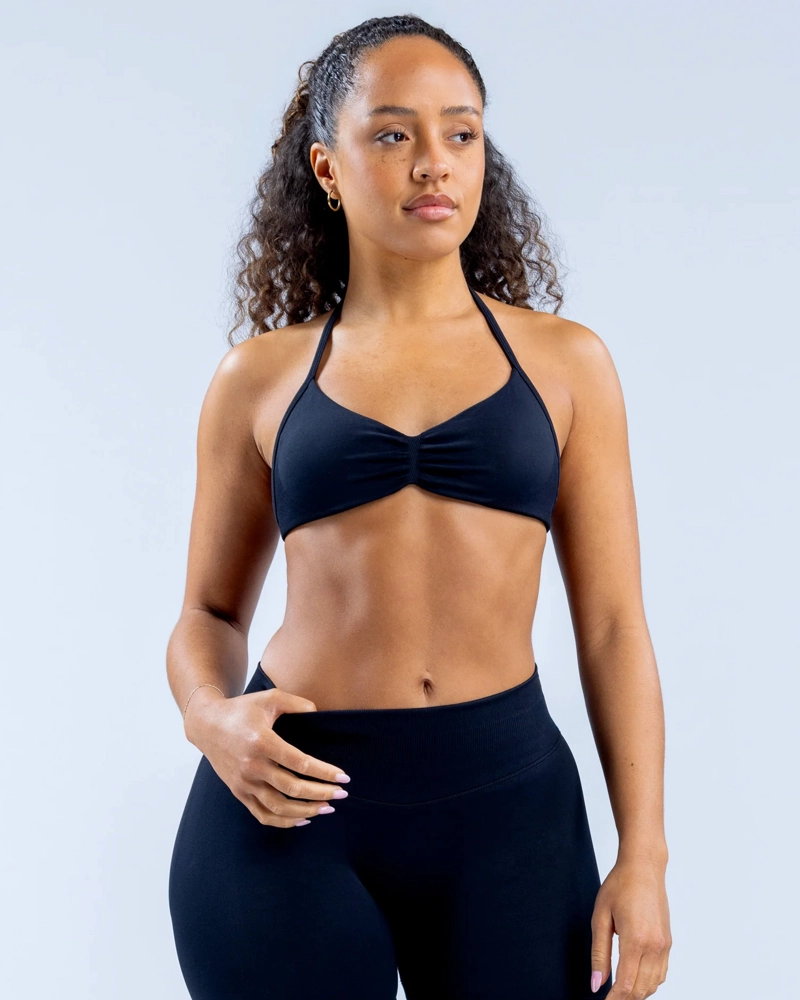 SET DEPORTIVO MUJER CALZA LEGGING Y TOP PETO HALTER - 1