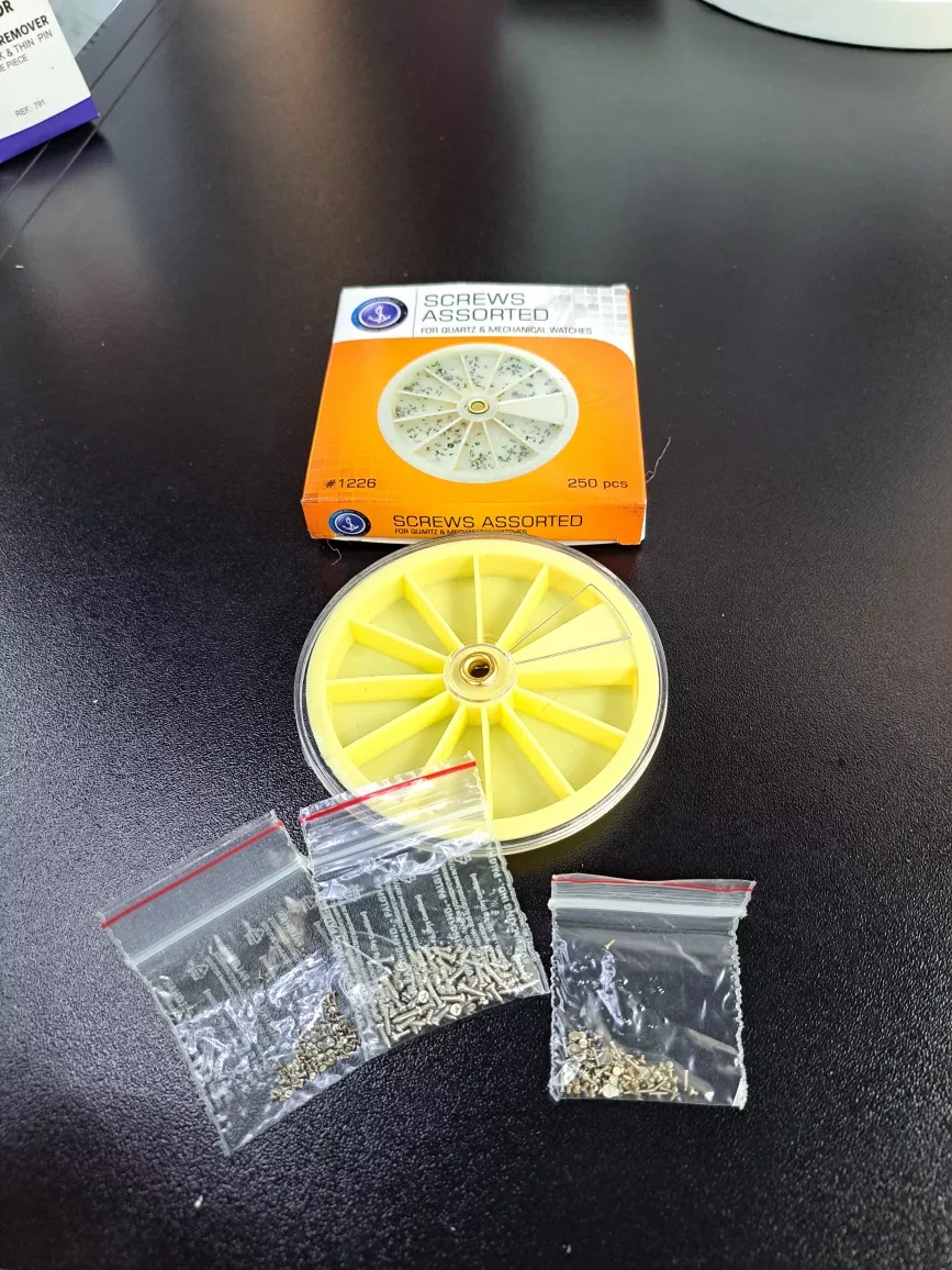 ORGANIZADOR Y TORNILLOS PARA RELOJ 250 U RELOJERÍA VIOLETA - 2