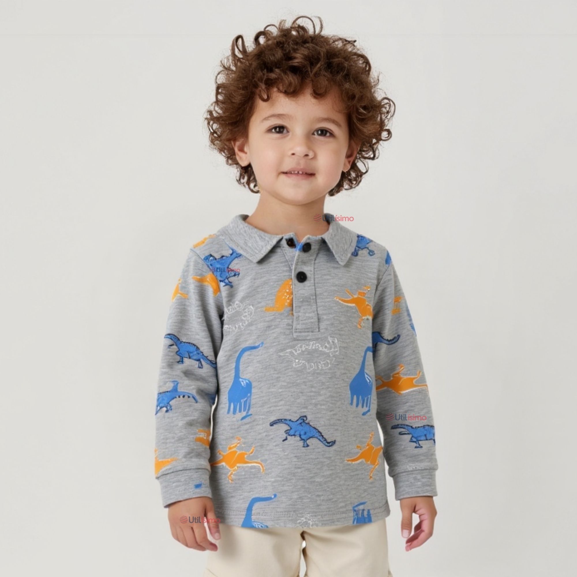 POLERA PIQUE MANGA LARGA NINO CON ESTAMPADO DE DINOSAURIOS GRIS