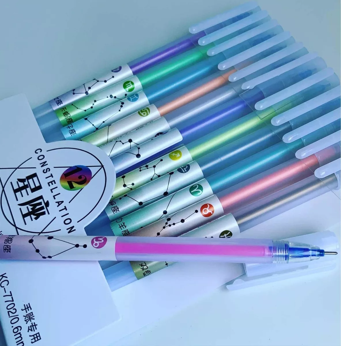 SET X12 LÁPICES TINTA DISEÑOS COSTELACIONES KAWAII - 1
