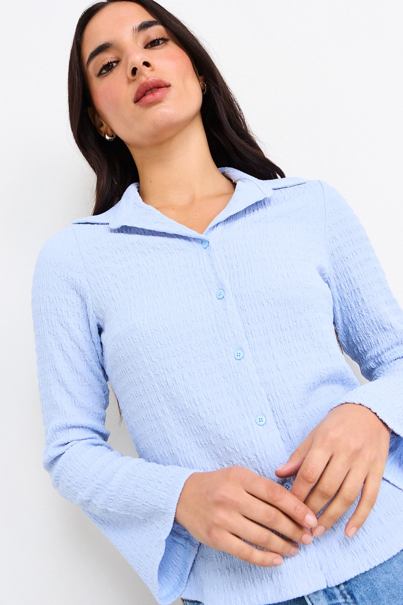 POLERA LISA CELESTE MUJER IO - 2