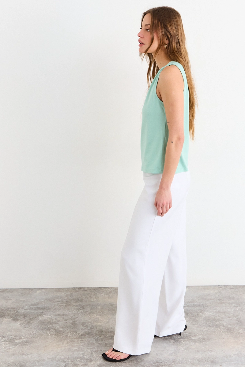 POLERA SIN MANGAS CELESTE MUJER IO - 5