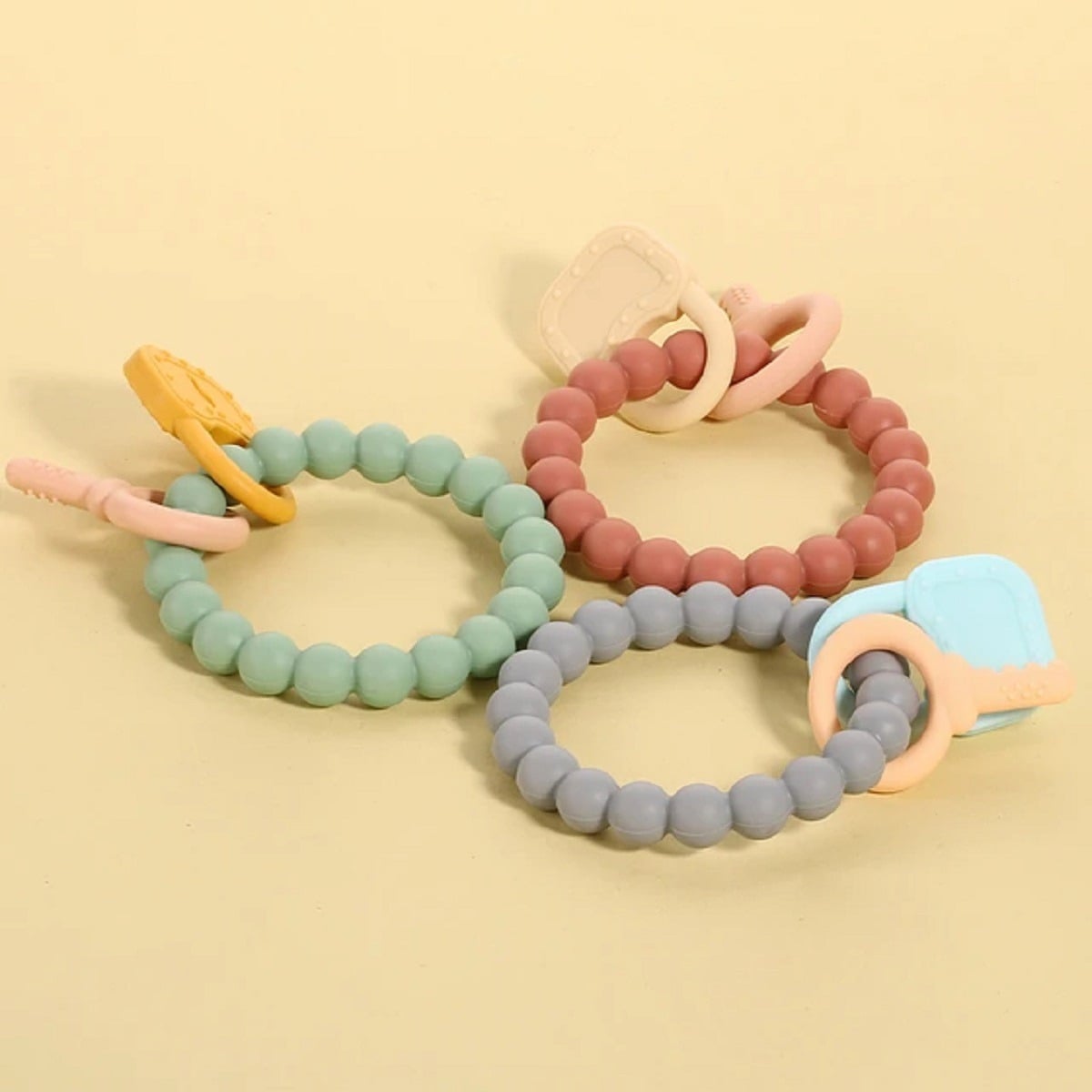 SET 3 MORDEDOR SILICONA PULSERA BEBÉ ALIVIO ENCÍAS JHN MULTICOLOR - 2